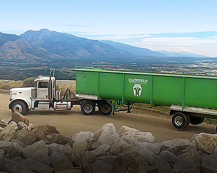 Waste disposal truck in mountains