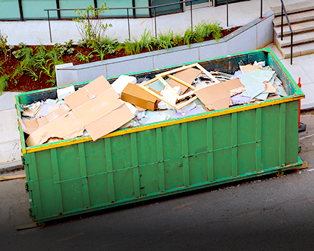 Dumpster filled with construction debris